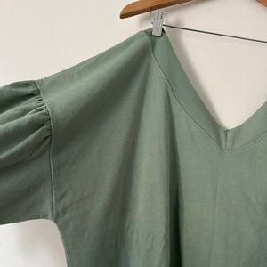 wide v neck teal sweater.